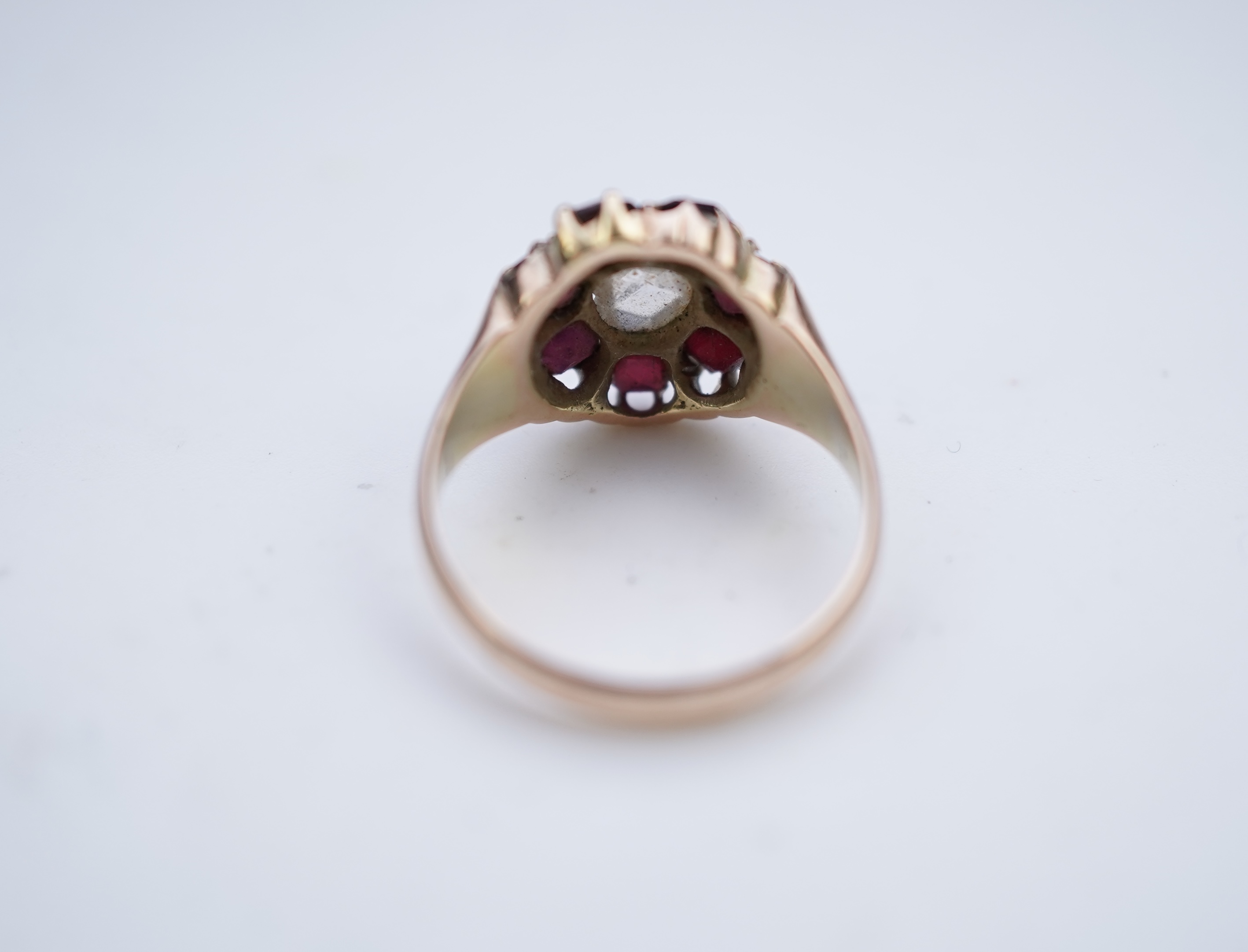 A garnet and diamond ring, late 19th century
